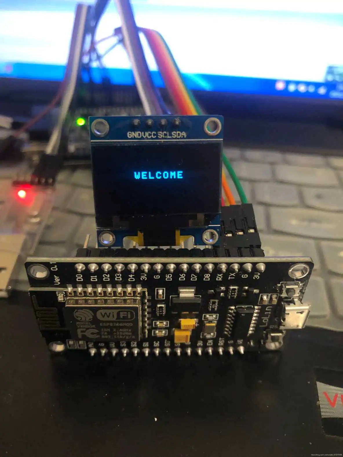 上边是0.96寸的OLED模块,下边是ESP8266,本页是开机默认页 esp8266天气时钟教程 esp8266 oled天气_嵌入式